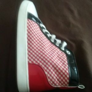 Christian loubitons hightop tennis shoes.